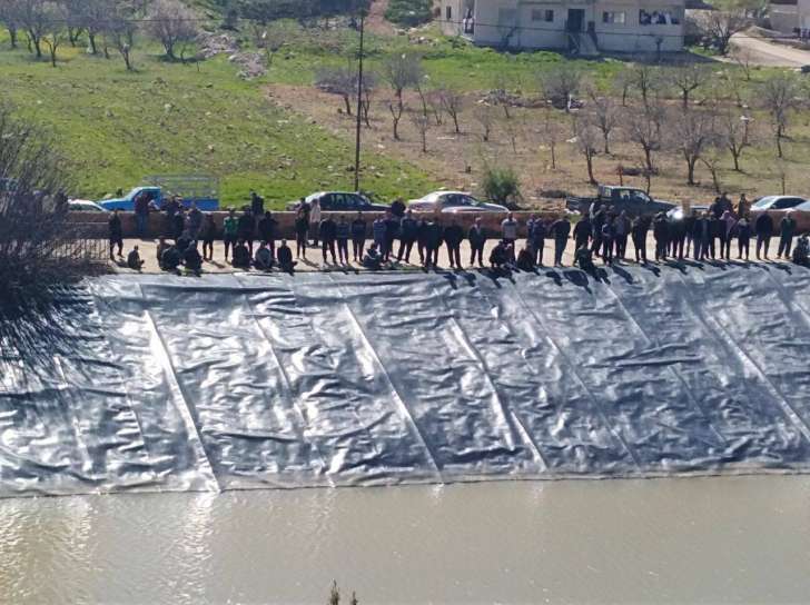 عجلون: انتشال جثتين لحدثين غرقا في بركة صناعية - صور