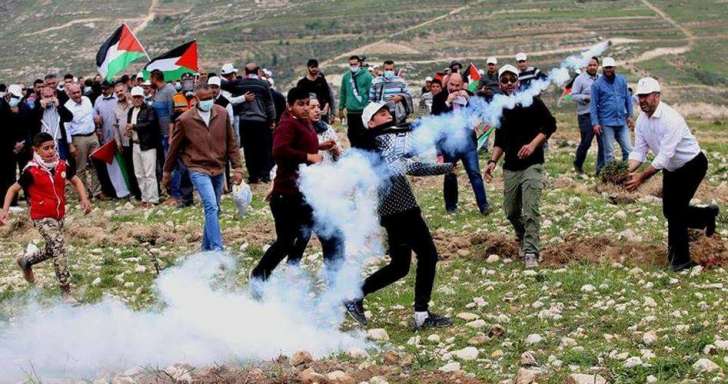 الصحة الفلسطينية: 14 شهيدا و1200 جريح في مسيرات يوم الارض بغزة - صور