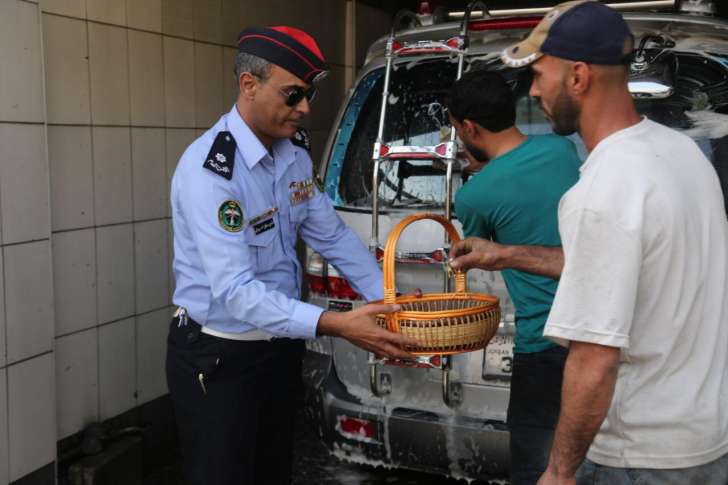 الامن العام تشارك عمال الاردن احتفالهم بعيد العمال - فيديو وصور