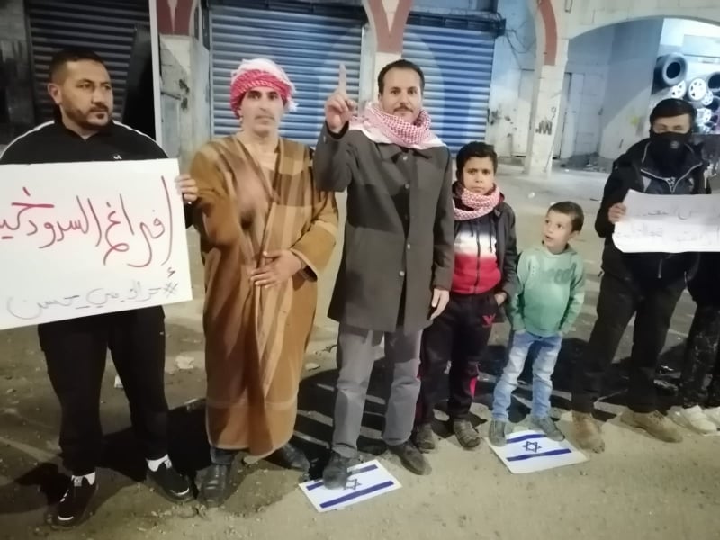 ناشطون من حراك بني حسن يحتجون على اتفاقية (الماء مقابل الكهرباء) - صور