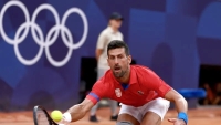 ديوكوفيتش يتأهل إلى نصف نهائي فردي التنس