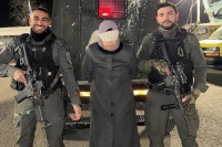 صورة اعتقال أرملة عياش تتحول لرمز جديد لجبروت الاحتلال وتثير الغضب